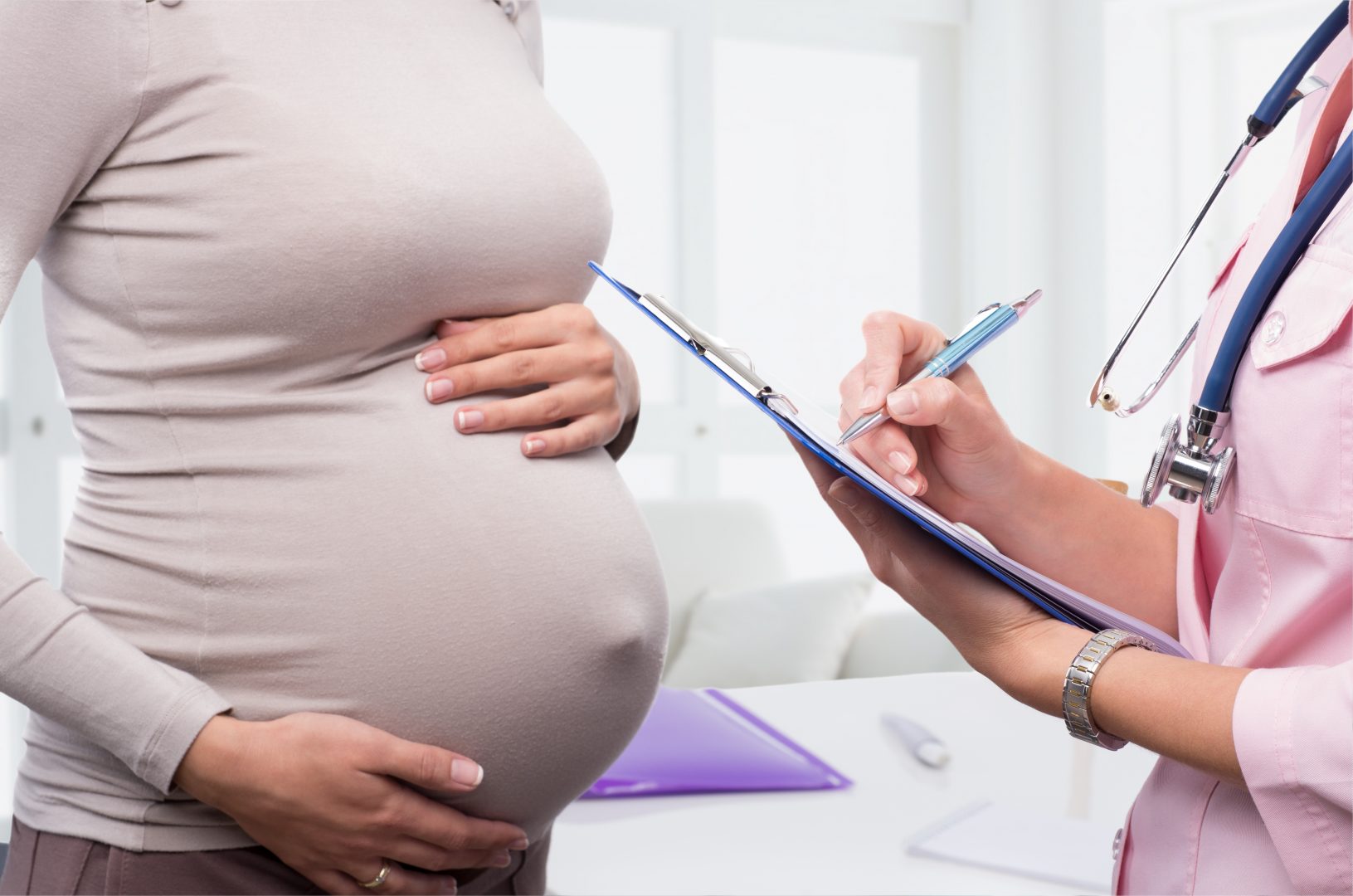 pregnant woman and doctor